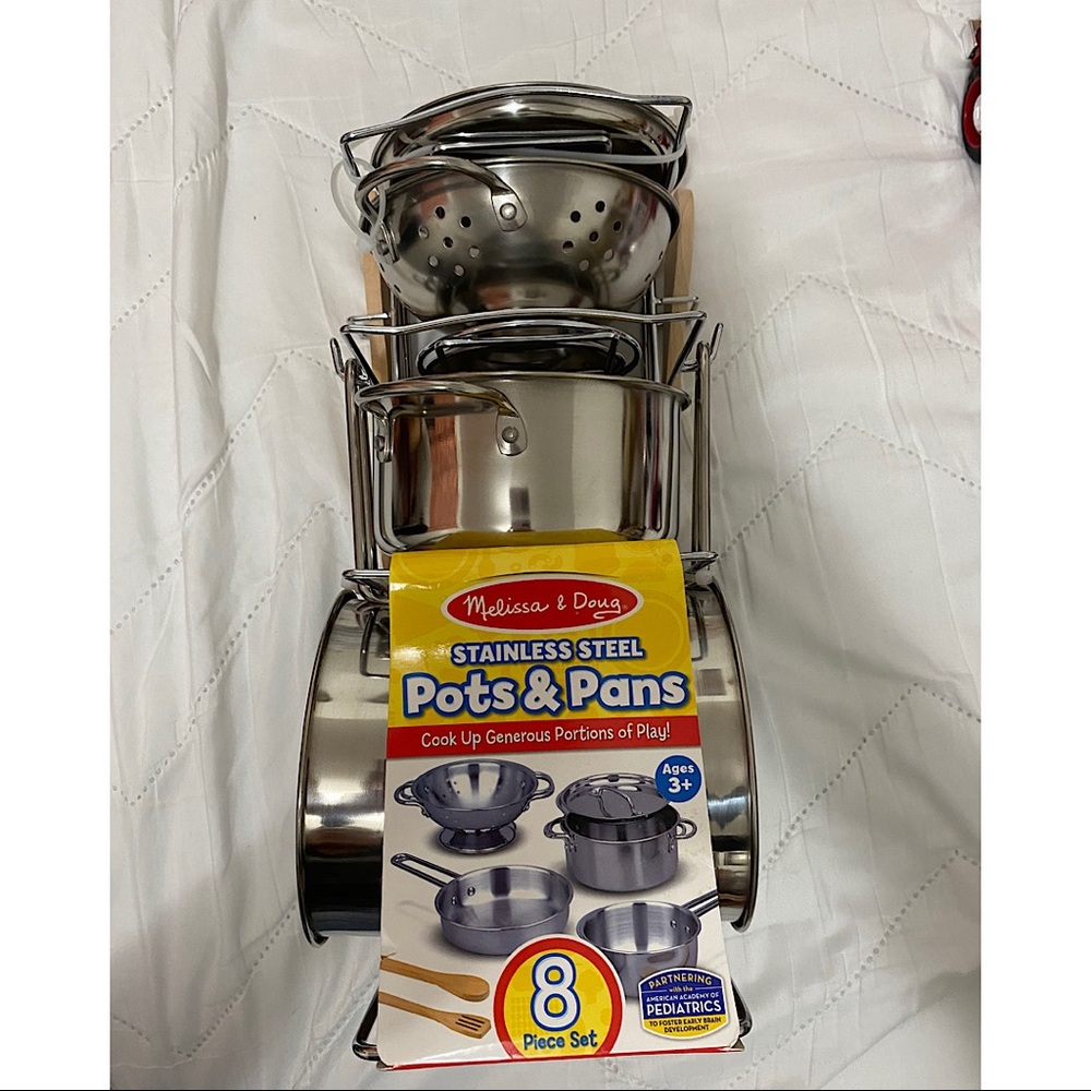 Brand new Melissa & Doug Stainless Steele pots and pans